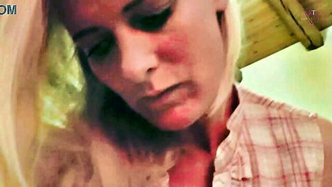 Blonde MILF mommy home alone in checkered blouse, contemplative look
