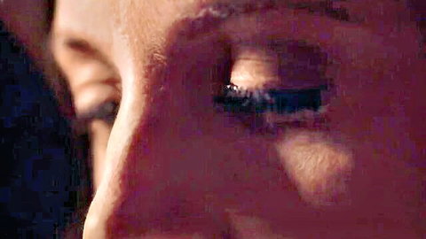 Angela White seductive eye close-up in lesbian scene with Jenna Foxx