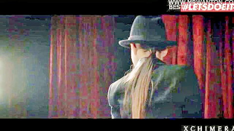 Jessica, horny Ukrainian teen in sexy black suit and hat, teasing from behind