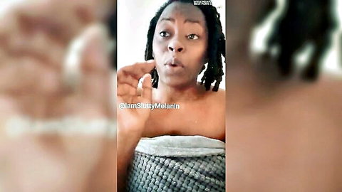 Ebony babe with braids opens mouth wide teasing finger suck wrapped in slipping towel