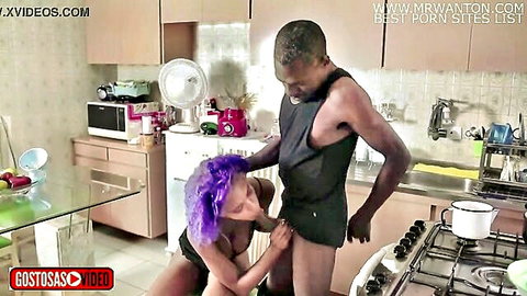 Curvy purple-haired Latina kneels in kitchen stroking big black cock handjob