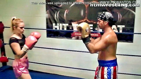 Blaten Lee MILF in pink boxing gear vs shirtless man in mixed ryona fight