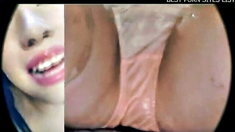 Asian woman smiling close-up with pink lips and matching pink ass lingerie view