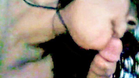 Brunette nurse in uniform giving intense blowjob close-up