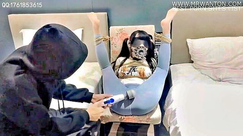 Bound Asian woman with slim waist teased by vibrator in BDSM