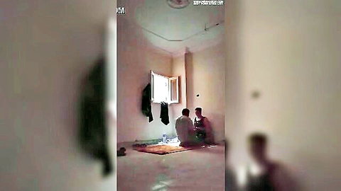 Blurry Arab men sitting on rug in sunlit room, bisexual tease preview