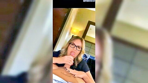 Blonde MILF in glasses eagerly sucking cock like a slut