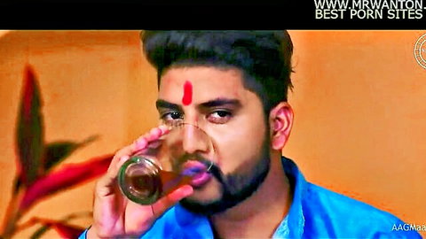 Indian man in blue kurta sipping drink in Adhuri Suhagraat Hindi XXX web series