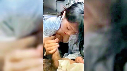 Blurry close-up of Asian woman in striped shirt giving blowjob outdoors, Japanese street hooker style