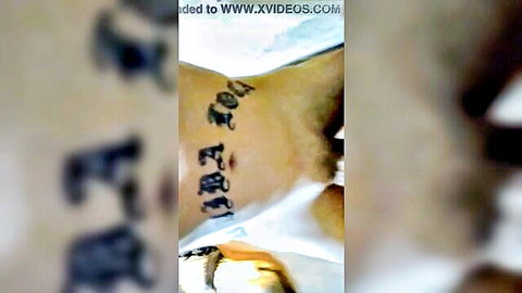 Tattooed muscular man close-up on abs and groin after creampie action