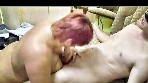 Redhead BBW mature woman rides naked man's cock cowgirl on couch grabbing his chest