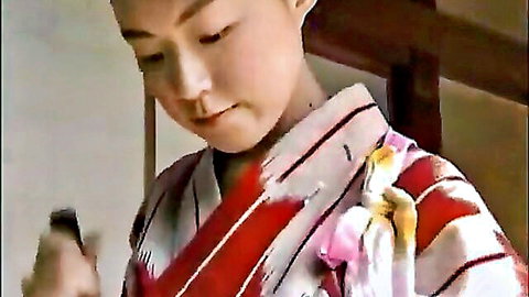 Young Japanese girl in red kimono, serene expression, JAV family sex thumbnail