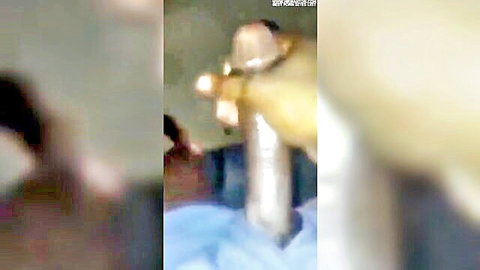 Blurry close-up of hand gripping thick veiny cock shaft