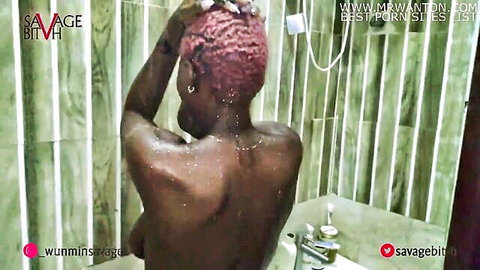 Ebony woman with big boobs showering nude, masturbating with dildo and squirting