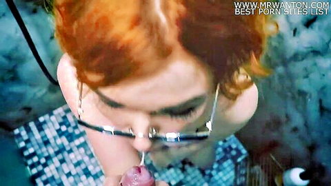 Redhead teen with glasses gets facefucked and deepthroats in bathroom