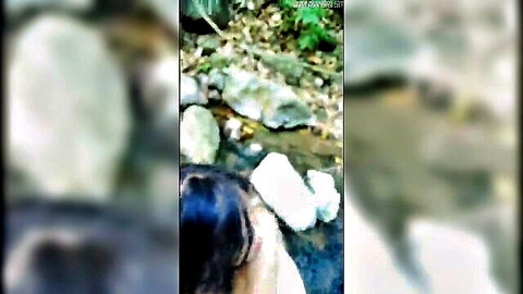 Blurry petite Latina teen kneels by forest stream sucking cock with cumshot splashing