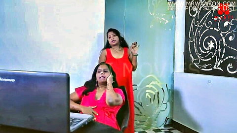 Two busty Indian women in pink top and red dress teasing lesbian scene