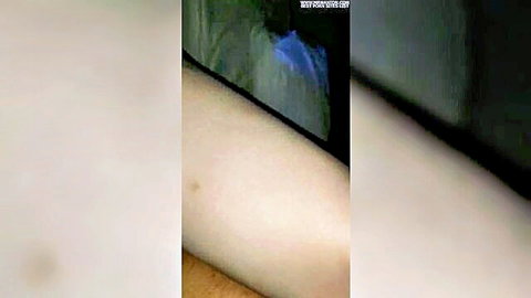 Blurry POV closeup of pale-skinned woman in intimate bedroom scene