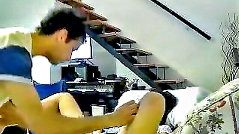 Indian boyfriend fingers his girlfriend's exposed pussy on living room couch