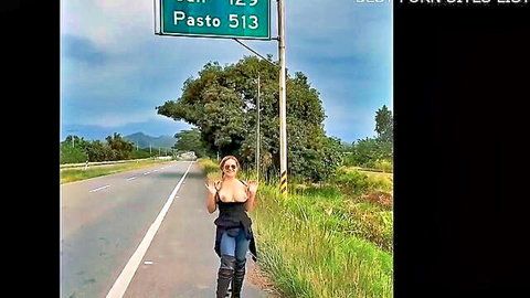 Blonde babe flashing large tits on rural road near Pasto sign