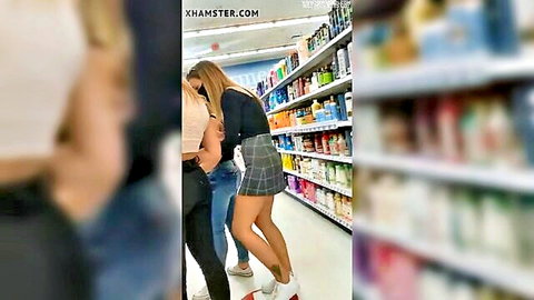 Hot blonde in thong and pleated skirt upskirt in supermarket