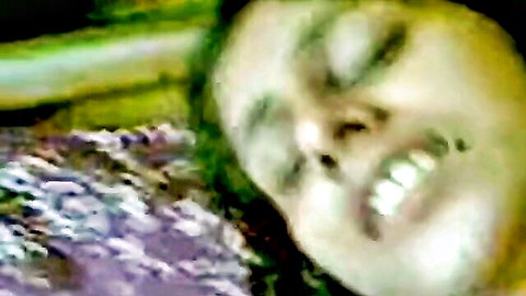 Indian aunty close-up smiling in ecstasy, mature beauty