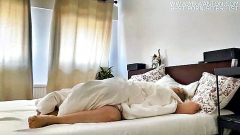 Carina's good morning in bed, sharing sheets with mom, nude tease
