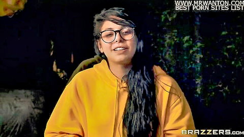 Alexis Fawx smiles in yellow hoodie, teasing Brazzers House orgy