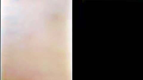 Blurry washed-out pink abstract split with solid black half
