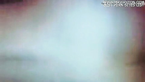 Blurry busty woman with massive tits teasing in purple haze porn thumbnail
