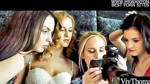 Four stunning women in lingerie in intimate lesbian group scene