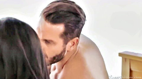 La Sirena passionately kissing her shirtless lover, seductive embrace