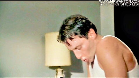 Sweaty muscular man in white tank top closeup from straight porn video