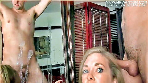 Naked man ejaculates thick cum from his hard cock onto blonde woman's face in intense facial cumshot
