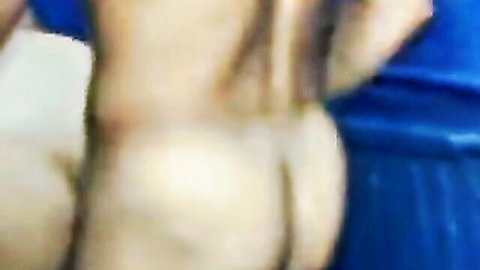 Blurry amateur closeup of pale woman's nude ass cheeks spread wide