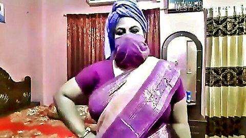 Curvy Indian MILF in tight purple sari flaunting huge tits and thick ass curves