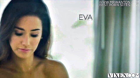 Seductive topless brunette babe Eva with long hair and bare shoulders closeup