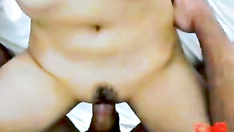 POV closeup of Chinese man's hairy balls and cock spread wide on hotel bed