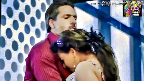 Indian bhabhi embraces man in red shirt, intimate couple moment