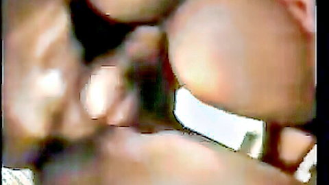 Blurry closeup of dark-skinned Indian woman's spread ass cheeks exposing tight brown pussy and anus