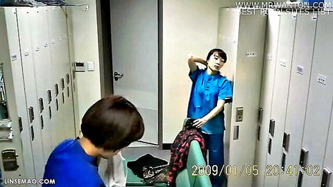 Two Asian nurses changing in locker room, blue uniforms, JAV tease