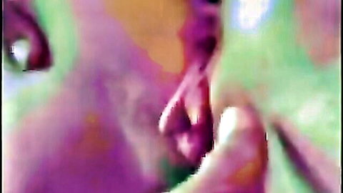 Blurry close-up of mature woman giving blowjob in motel