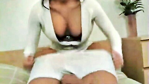 Tiffany in deep cleavage white dress giving pantyjob to guy