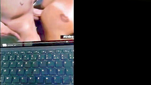 Hot wife giving handjob while husband watches porn on laptop POV
