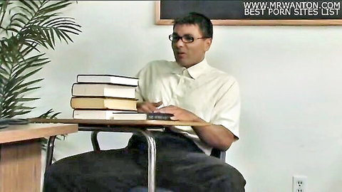 Nerdy Asian man in glasses sitting at desk, teasing classroom fantasy