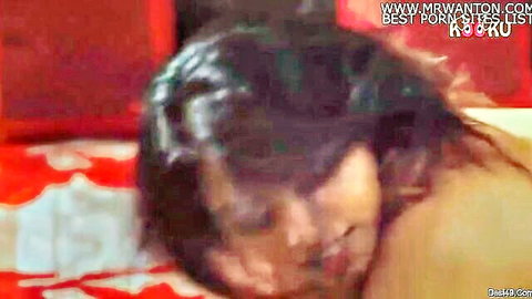 Sweaty Indian mature babe with open mouth in ecstasy on red bed during rough sex