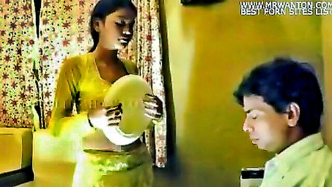 Desi Indian woman in yellow saree holding plate teases sitting man in adult web serial part 2