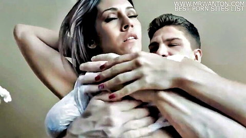 Raylene as horny mom in intense son embrace, big tits groped