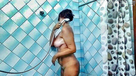 Lukerya mature brunette naked in shower, big tits wet body