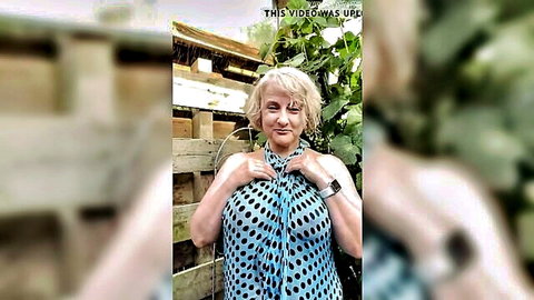 Michelle's Nylons teases neighbor with cleavage in polka dot dress outdoors